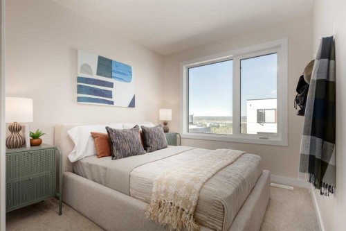 84-1453 Na'A Drive Sw, Calgary, AB - Indoor Photo Showing Bedroom