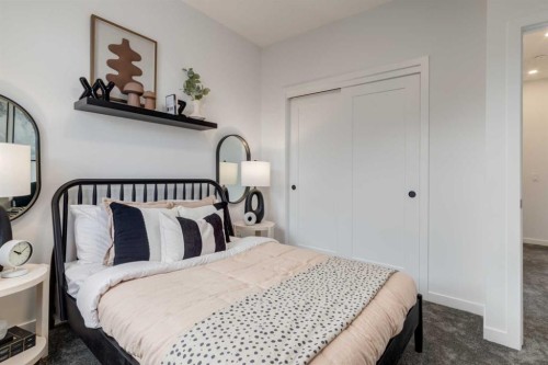 13-1453 Na'A Drive Sw, Calgary, AB - Indoor Photo Showing Bedroom
