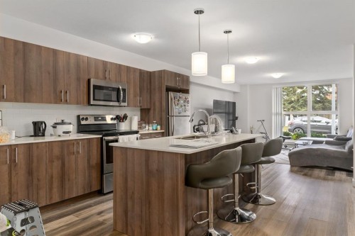 303 Waddy Lane, Strathmore, AB - Indoor Photo Showing Kitchen With Stainless Steel Kitchen