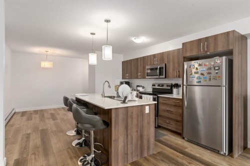 303 Waddy Lane, Strathmore, AB - Indoor Photo Showing Kitchen With Stainless Steel Kitchen With Upgraded Kitchen