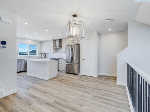 235 Aquila Way Nw, Calgary, AB - Indoor Photo Showing Kitchen With Upgraded Kitchen