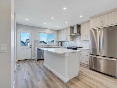 235 Aquila Way Nw, Calgary, AB - Indoor Photo Showing Kitchen With Upgraded Kitchen