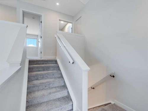 235 Aquila Way Nw, Calgary, AB - Indoor Photo Showing Other Room
