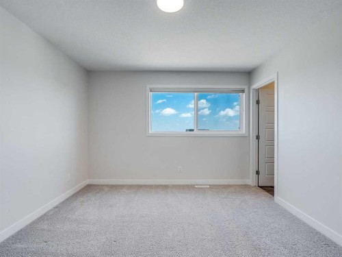 235 Aquila Way Nw, Calgary, AB - Indoor Photo Showing Other Room