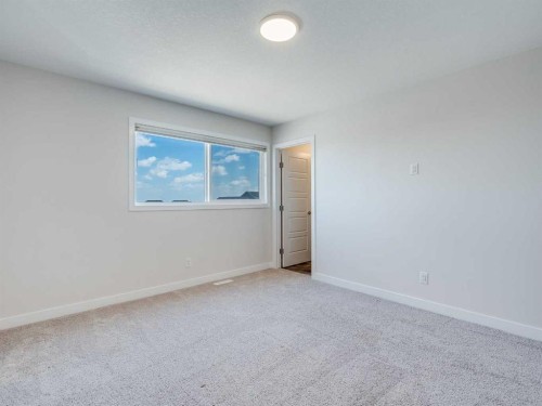235 Aquila Way Nw, Calgary, AB - Indoor Photo Showing Other Room