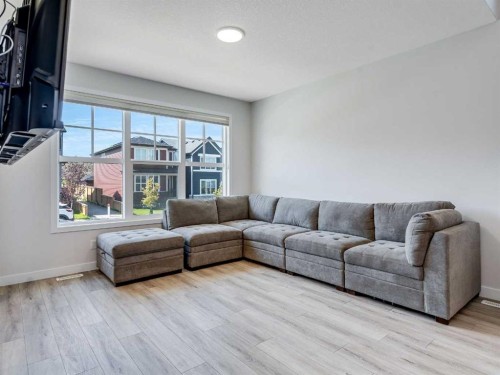 235 Aquila Way Nw, Calgary, AB - Indoor Photo Showing Living Room