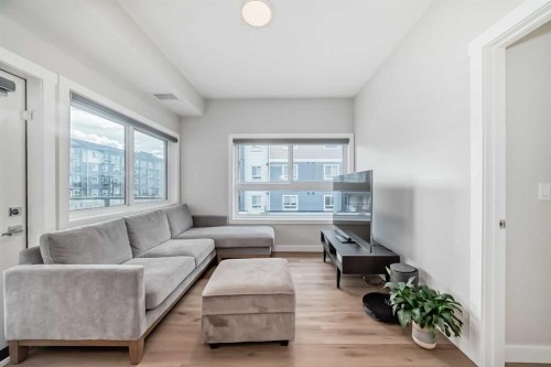 2202-151 Skyview Bay Ne, Calgary, AB - Indoor Photo Showing Living Room