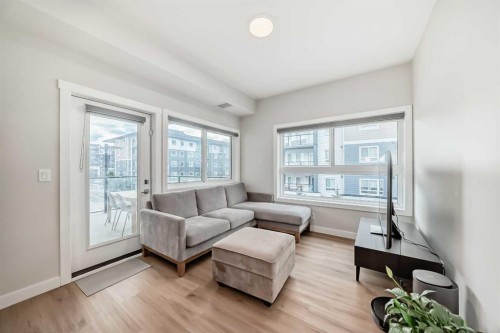 2202-151 Skyview Bay Ne, Calgary, AB - Indoor Photo Showing Living Room
