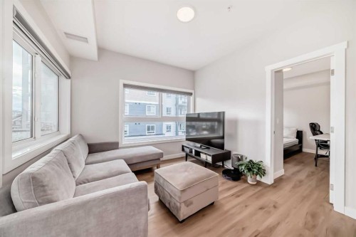 2202-151 Skyview Bay Ne, Calgary, AB - Indoor Photo Showing Living Room