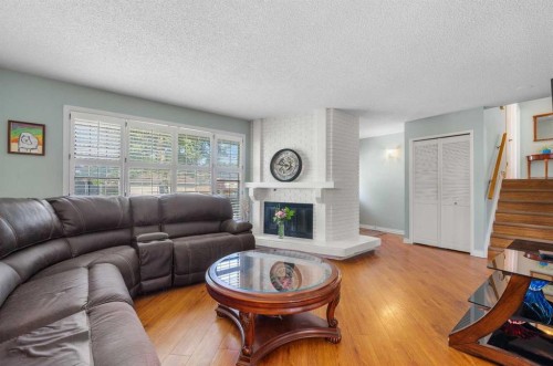232 Templeside Circle Ne, Calgary, AB - Indoor Photo Showing Living Room With Fireplace