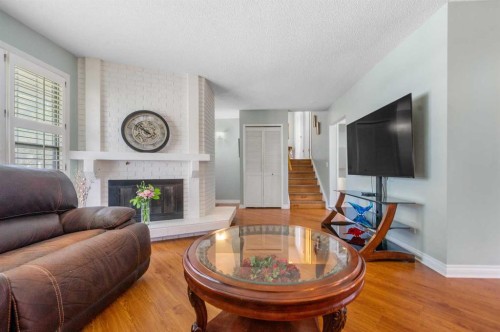 232 Templeside Circle Ne, Calgary, AB - Indoor Photo Showing Living Room With Fireplace