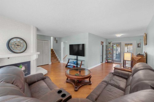 232 Templeside Circle Ne, Calgary, AB - Indoor Photo Showing Living Room With Fireplace