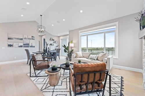 33 North Bridges Landing, Langdon, AB - Indoor Photo Showing Living Room