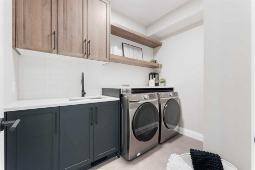 33 North Bridges Landing, Langdon, AB - Indoor Photo Showing Laundry Room
