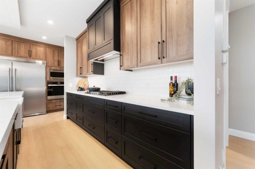 33 North Bridges Landing, Langdon, AB - Indoor Photo Showing Kitchen With Stainless Steel Kitchen