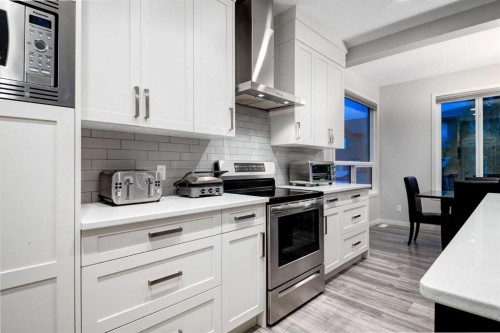 19 West Grove Place Sw, Calgary, AB - Indoor Photo Showing Kitchen