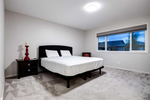 19 West Grove Place Sw, Calgary, AB - Indoor Photo Showing Bedroom