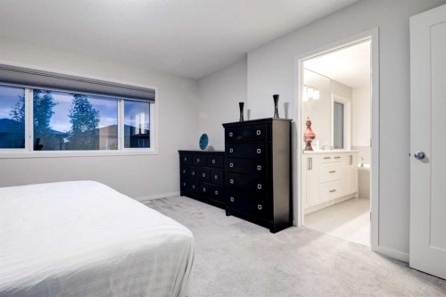 19 West Grove Place Sw, Calgary, AB - Indoor Photo Showing Bedroom