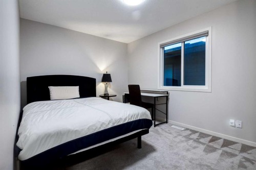 19 West Grove Place Sw, Calgary, AB - Indoor Photo Showing Bedroom