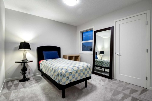 19 West Grove Place Sw, Calgary, AB - Indoor Photo Showing Bedroom