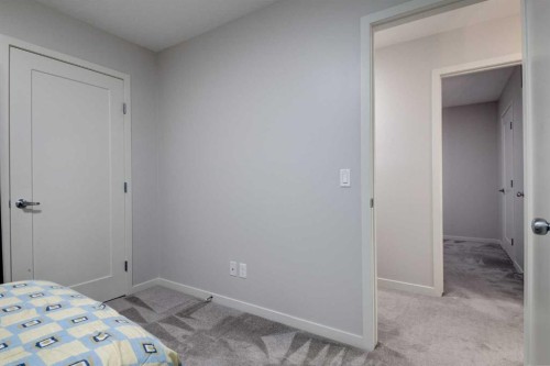 19 West Grove Place Sw, Calgary, AB - Indoor Photo Showing Bedroom