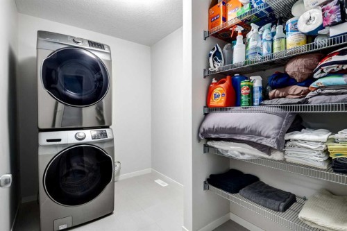 19 West Grove Place Sw, Calgary, AB - Indoor Photo Showing Laundry Room