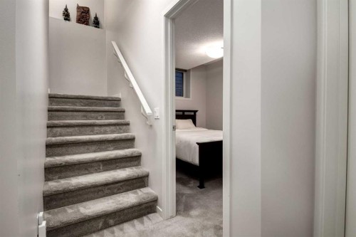 19 West Grove Place Sw, Calgary, AB - Indoor Photo Showing Other Room