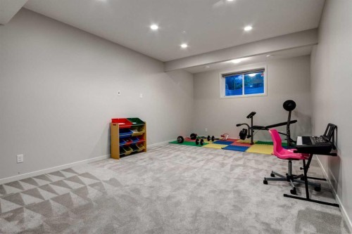 19 West Grove Place Sw, Calgary, AB - Indoor Photo Showing Gym Room