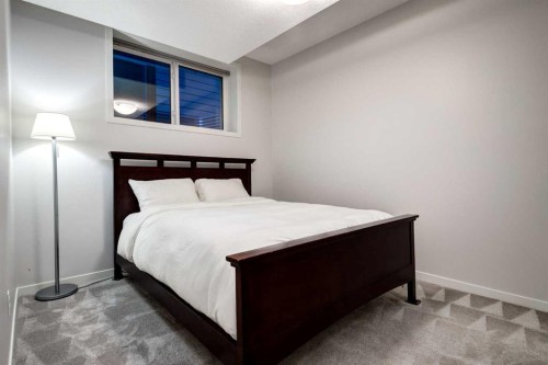 19 West Grove Place Sw, Calgary, AB - Indoor Photo Showing Bedroom