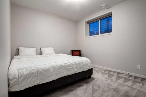 19 West Grove Place Sw, Calgary, AB - Indoor Photo Showing Bedroom