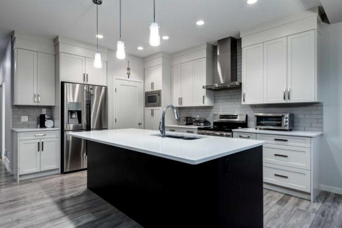 19 West Grove Place Sw, Calgary, AB - Indoor Photo Showing Kitchen With Upgraded Kitchen