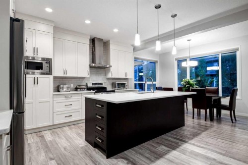 19 West Grove Place Sw, Calgary, AB - Indoor Photo Showing Kitchen With Upgraded Kitchen