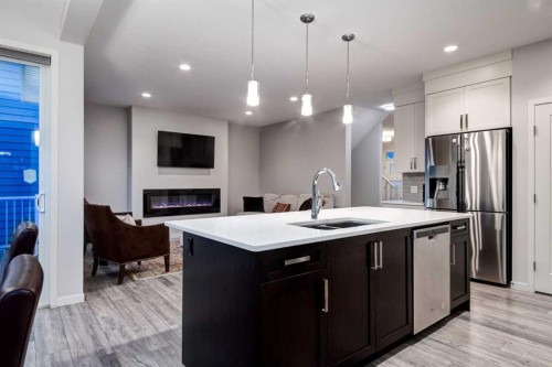 19 West Grove Place Sw, Calgary, AB - Indoor Photo Showing Kitchen With Double Sink With Upgraded Kitchen