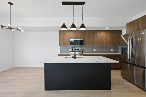 1514 25 Street, Didsbury, AB - Indoor Photo Showing Kitchen With Upgraded Kitchen