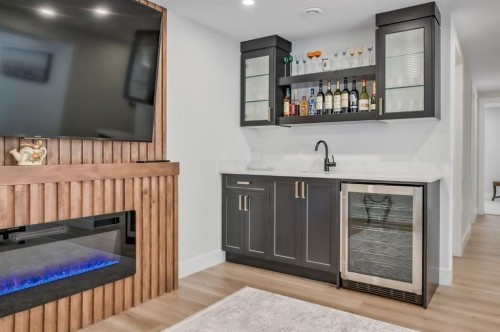 2003 Christie Road Nw, Calgary, AB - Indoor Photo Showing Other Room With Fireplace