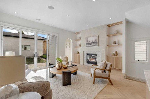 1741 48 Avenue Sw, Calgary, AB - Indoor Photo Showing Living Room With Fireplace