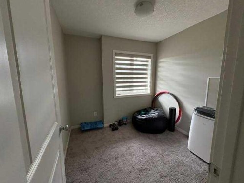 202 Evansridge Park Nw, Calgary, AB - Indoor Photo Showing Other Room