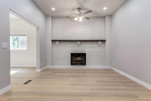 204 Hawkhill Way Nw, Calgary, AB - Indoor Photo Showing Other Room With Fireplace