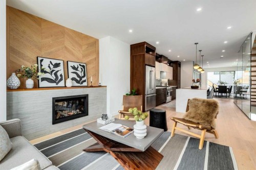 1612 16A Street Se, Calgary, AB - Indoor Photo Showing Living Room With Fireplace