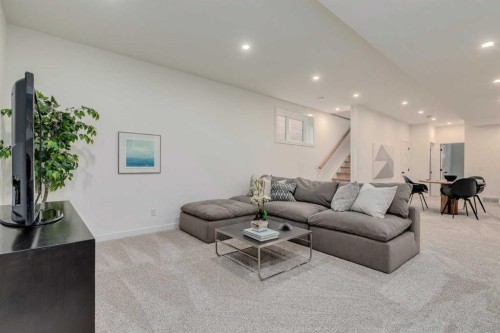 1612 16A Street Se, Calgary, AB - Indoor Photo Showing Living Room