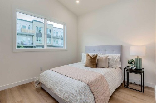 1612 16A Street Se, Calgary, AB - Indoor Photo Showing Bedroom