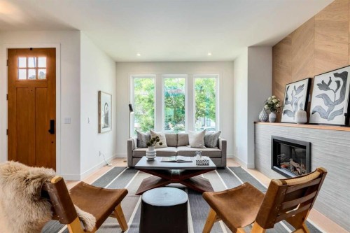 1612 16A Street Se, Calgary, AB - Indoor Photo Showing Other Room With Fireplace