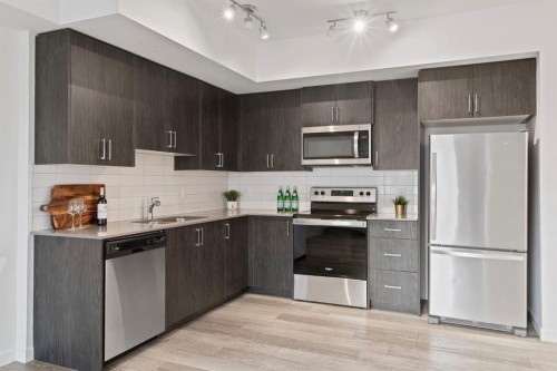 3117-3727 Sage Hill Drive Nw, Calgary, AB - Indoor Photo Showing Kitchen With Stainless Steel Kitchen With Upgraded Kitchen