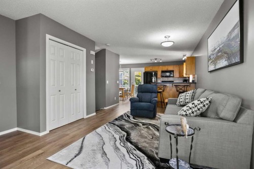 701 Prairie Sound Circle Nw, High River, AB - Indoor Photo Showing Living Room