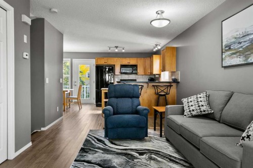 701 Prairie Sound Circle Nw, High River, AB - Indoor Photo Showing Living Room