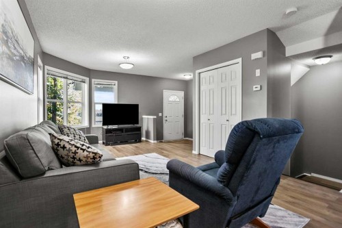 701 Prairie Sound Circle Nw, High River, AB - Indoor Photo Showing Living Room