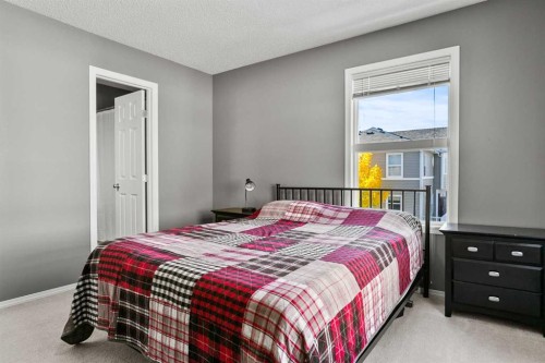 701 Prairie Sound Circle Nw, High River, AB - Indoor Photo Showing Bedroom
