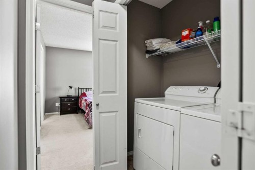 701 Prairie Sound Circle Nw, High River, AB - Indoor Photo Showing Laundry Room