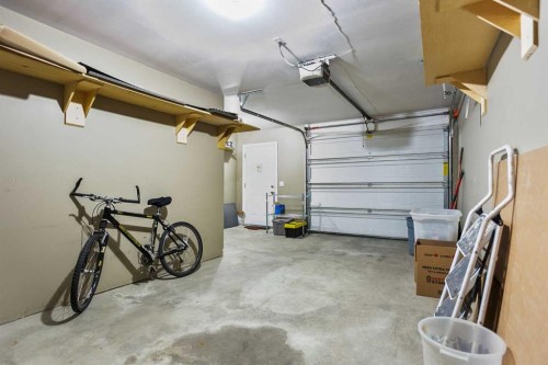 701 Prairie Sound Circle Nw, High River, AB - Indoor Photo Showing Garage