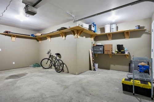 701 Prairie Sound Circle Nw, High River, AB - Indoor Photo Showing Garage